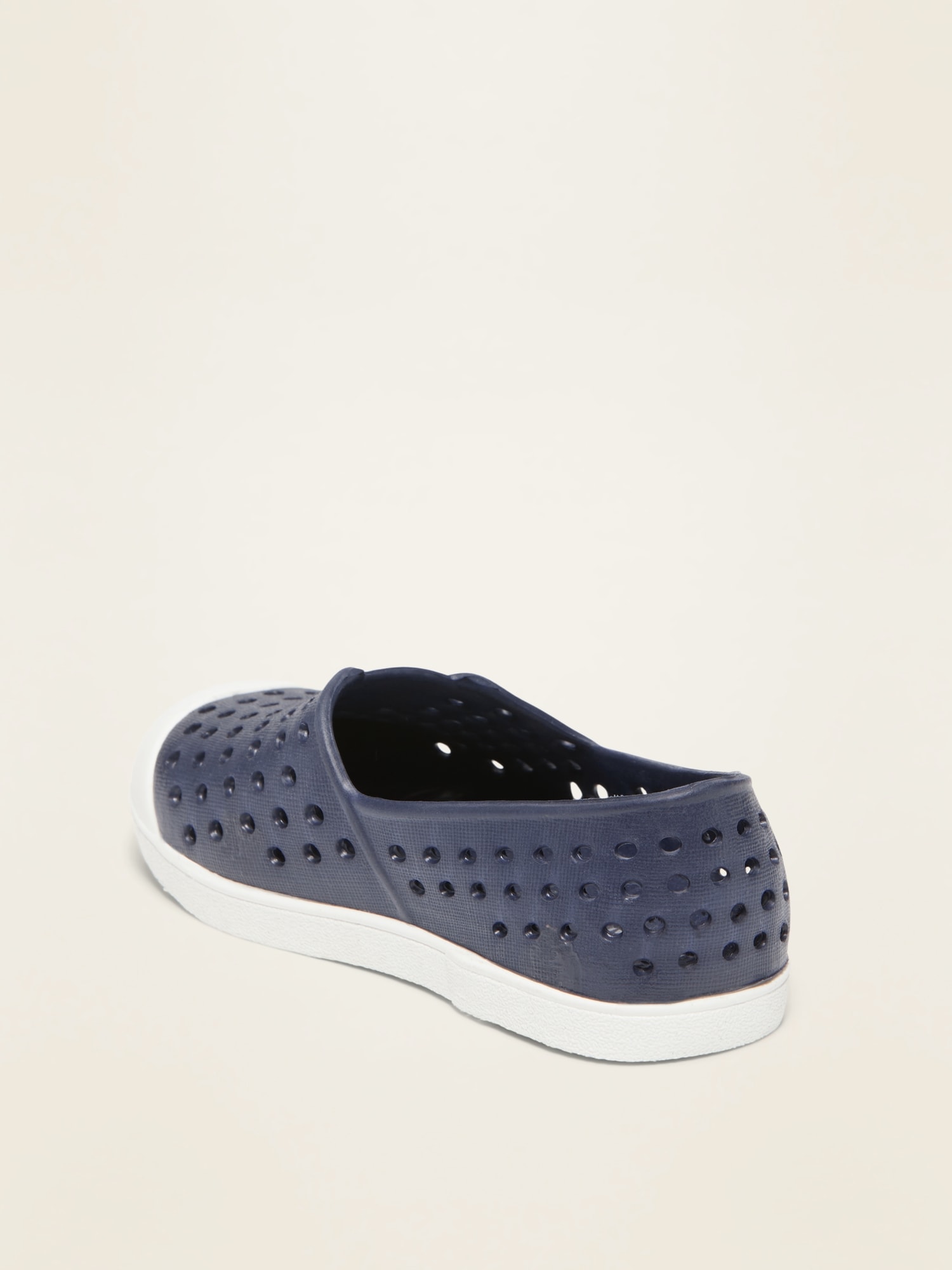 slip on perforated sneakers