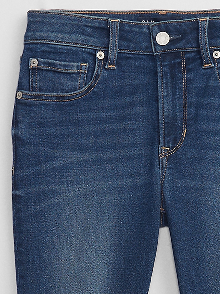 Mid Rise Destructed Universal Skinny Jeans