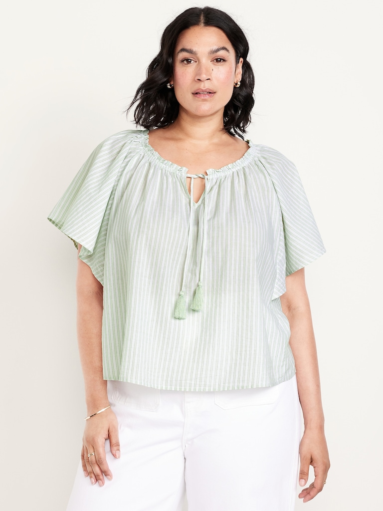 Haut à manches flottantes et noué à pampilles