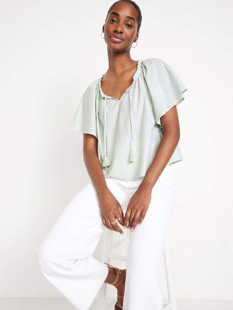 Haut à manches flottantes et noué à pampilles