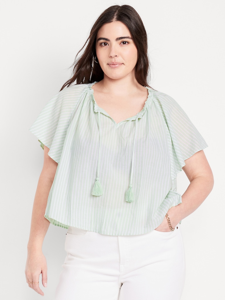 Haut à manches flottantes et noué à pampilles