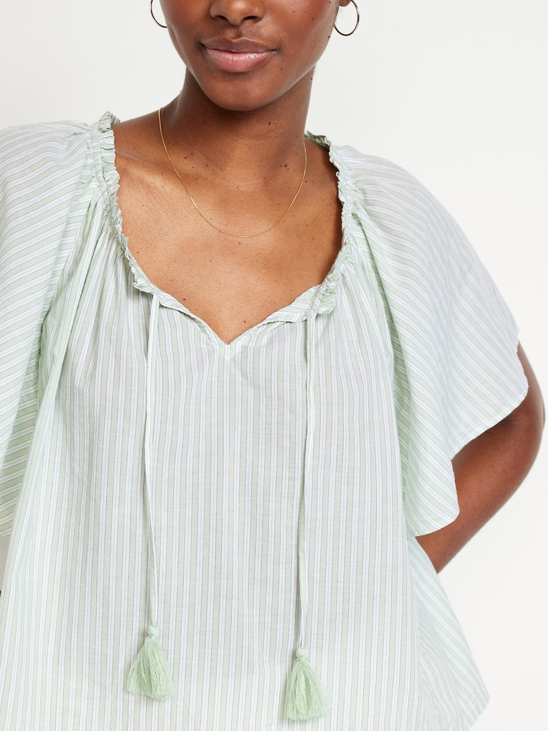 Haut à manches flottantes et noué à pampilles