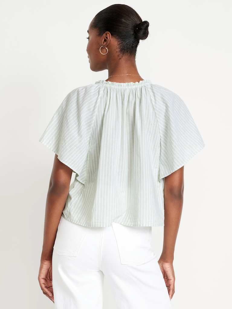 Haut à manches flottantes et noué à pampilles