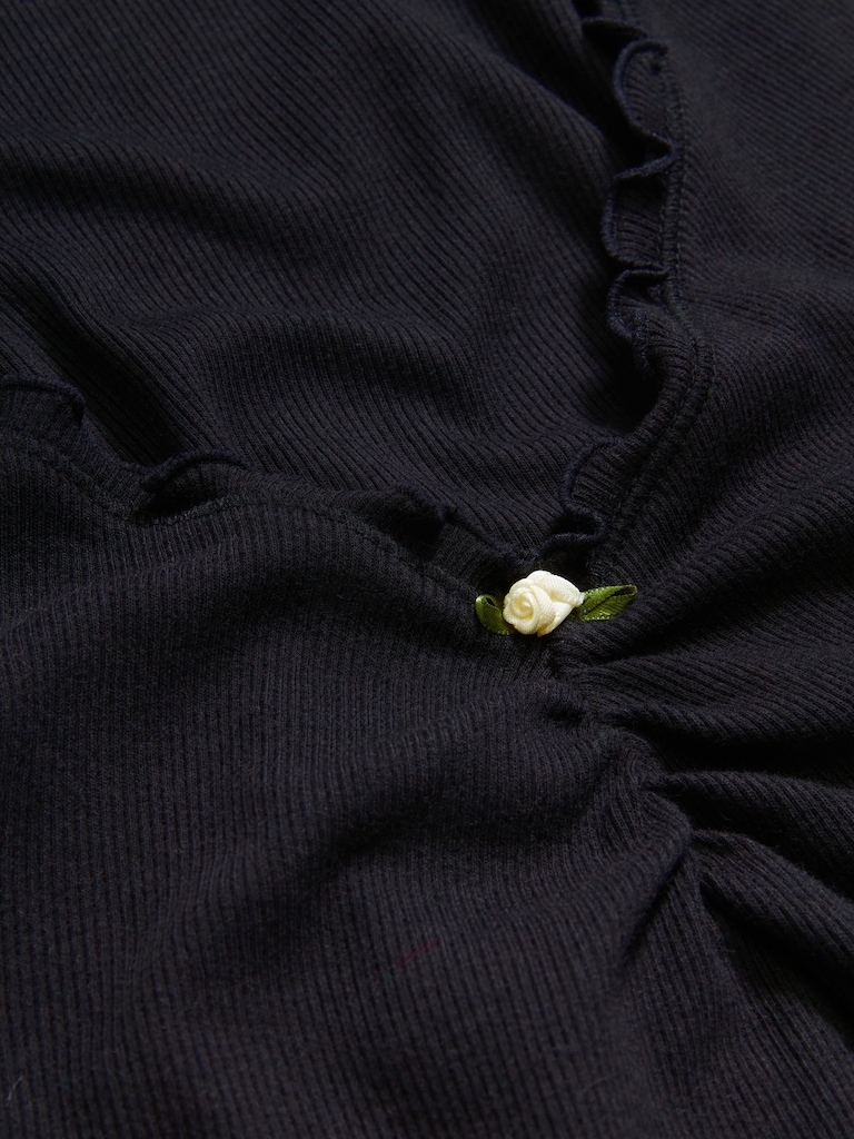 Camisole cintrée en tricot côtelé.