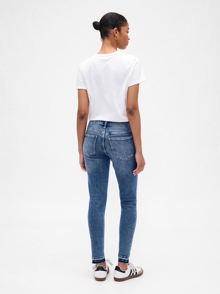 Mid Rise Destructed Universal Skinny Jeans