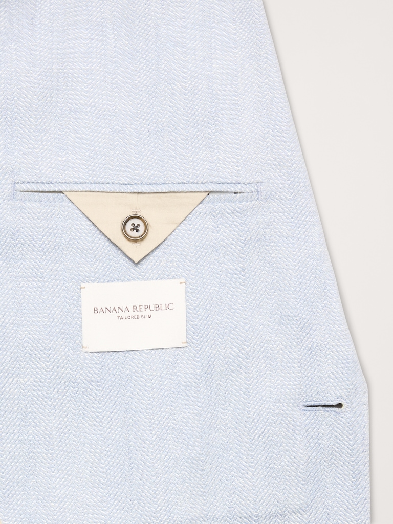 Veste de complet en lin et laine mérinos à motif de chevrons à coupe ajustée cintrée