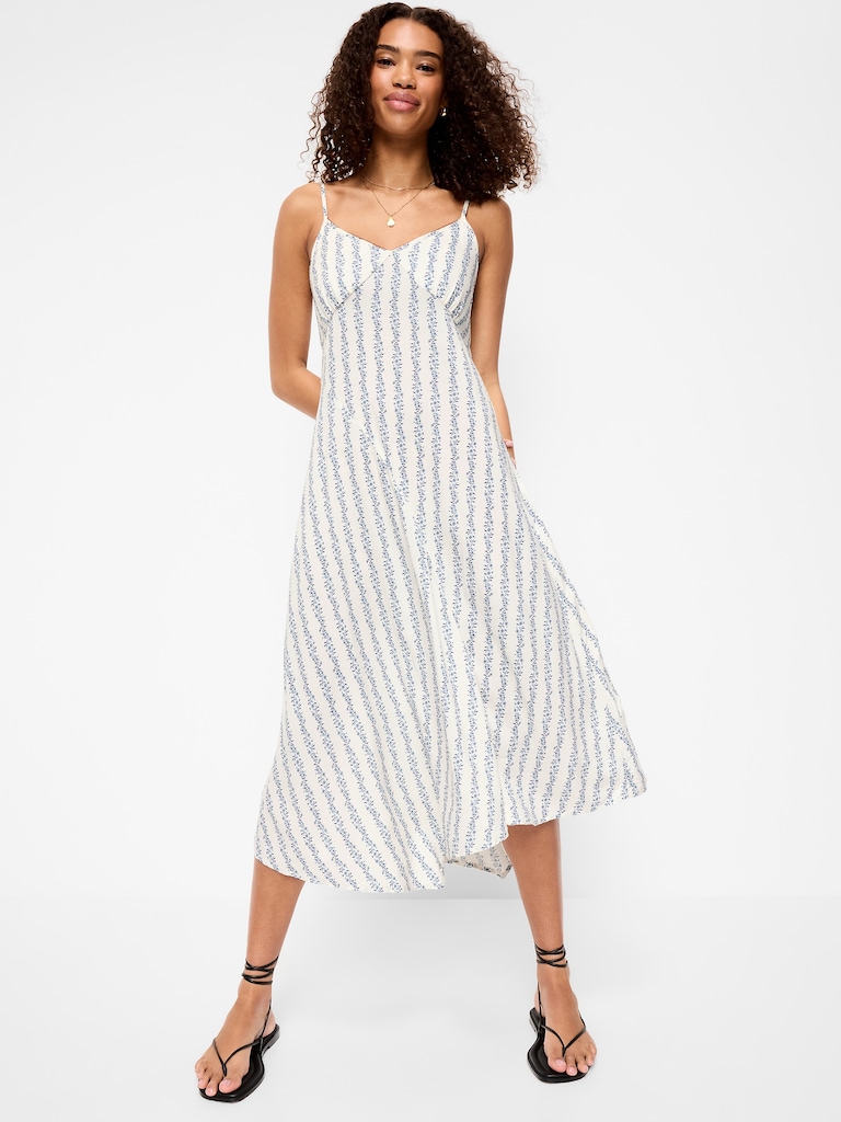 Robe mi-longue ajustée et évasée nouée au dos