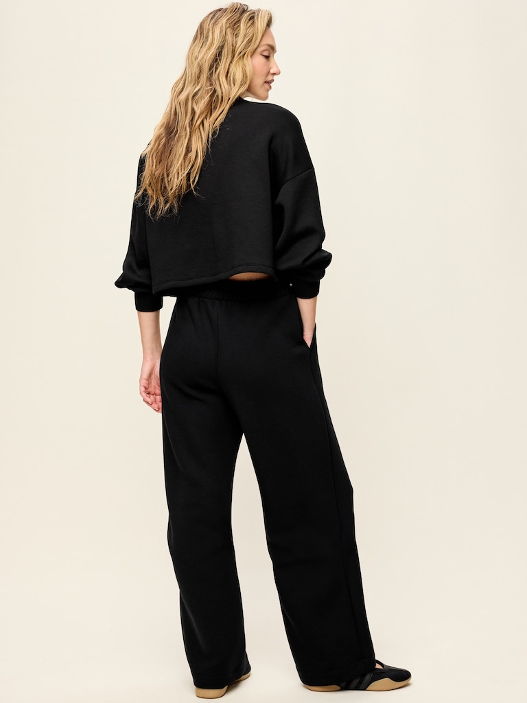 Pantalon jambe large à taille haute en molleton qui reprend sa forme