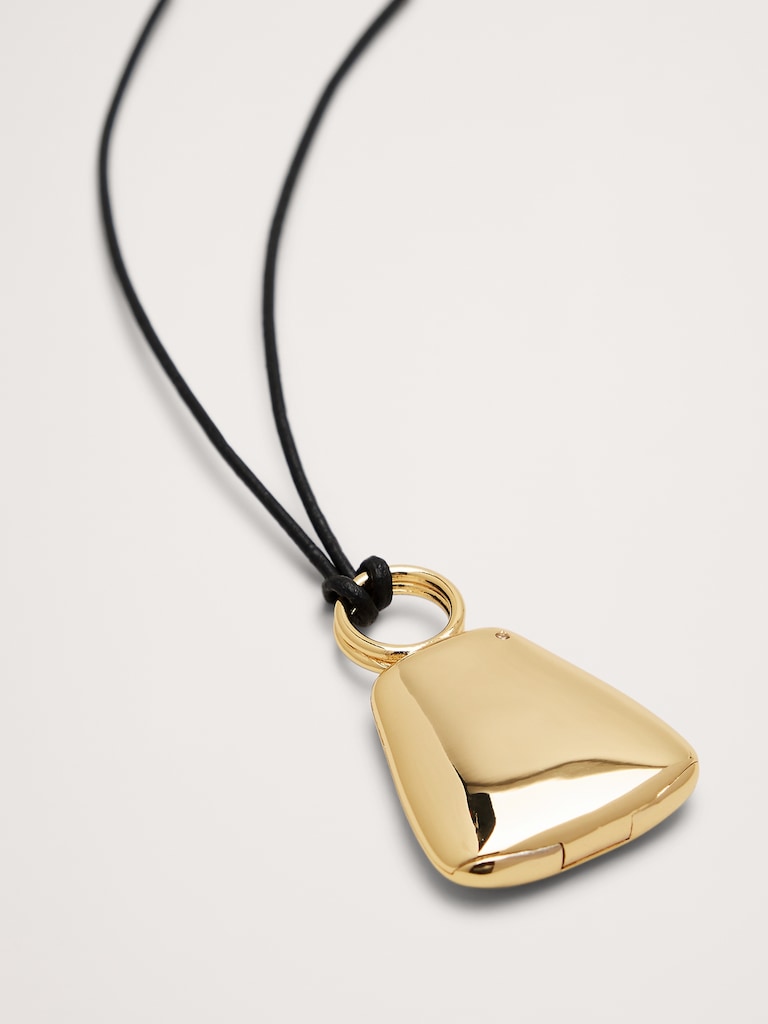 Collier en cordon de cuir avec pendentif en forme de flacon